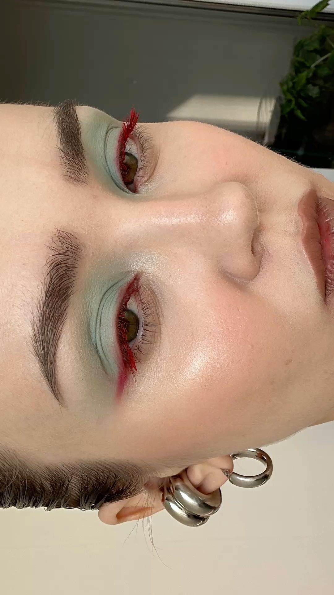 Blue and red eyes makeup