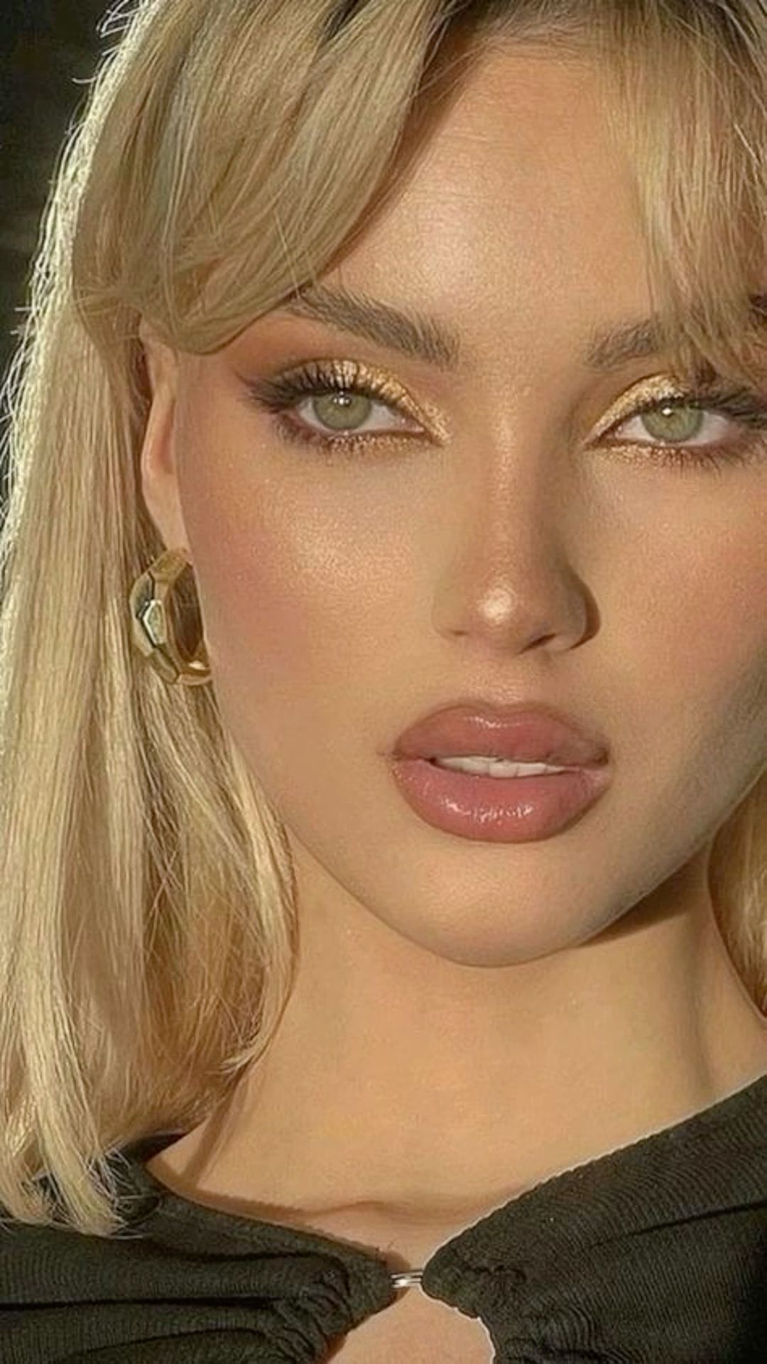 Gold makeup recreation on TikTok @augustahaynes (linked)